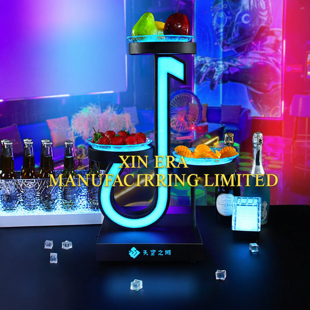 Luminous music note shaped snack tray with RGB LED lighting in a dark VIP lounge setting.