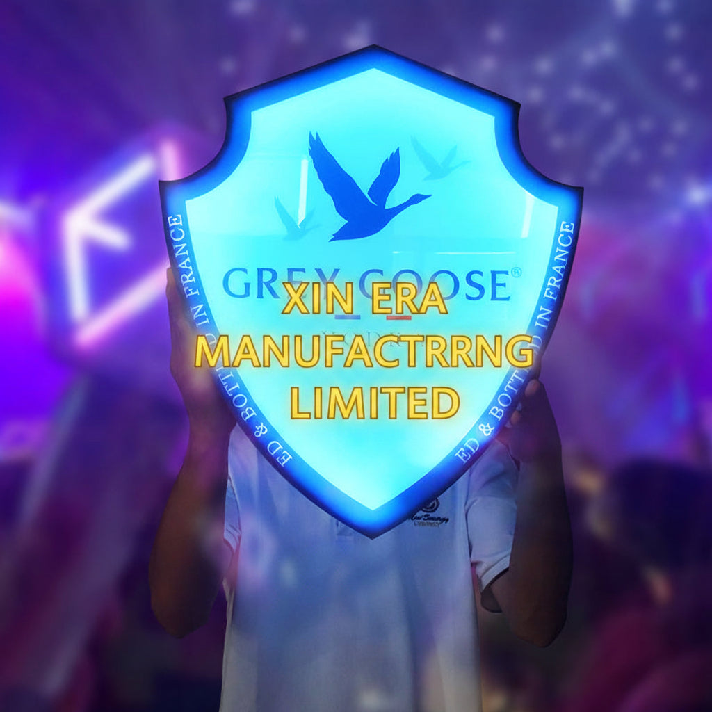 Glow in the dark winged presenter board with cyan and light blue linear LED illumination
