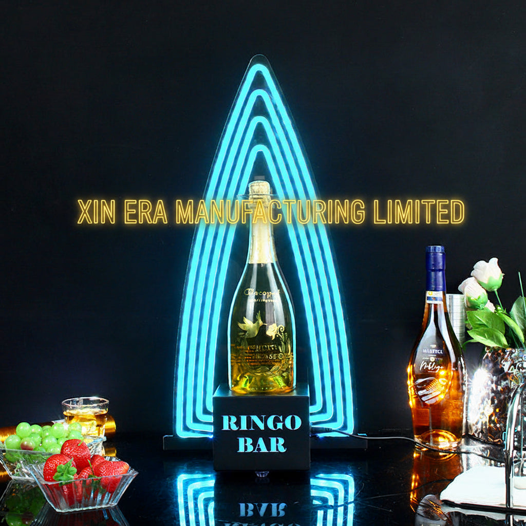 Glow in the dark champagne serving pedestal with sharp ice blue illuminated backdrop arches and custom logo